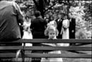 Flower girl brooding at an outdoor wedding
