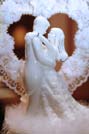 Closeup of the ornament on top of a wedding cake